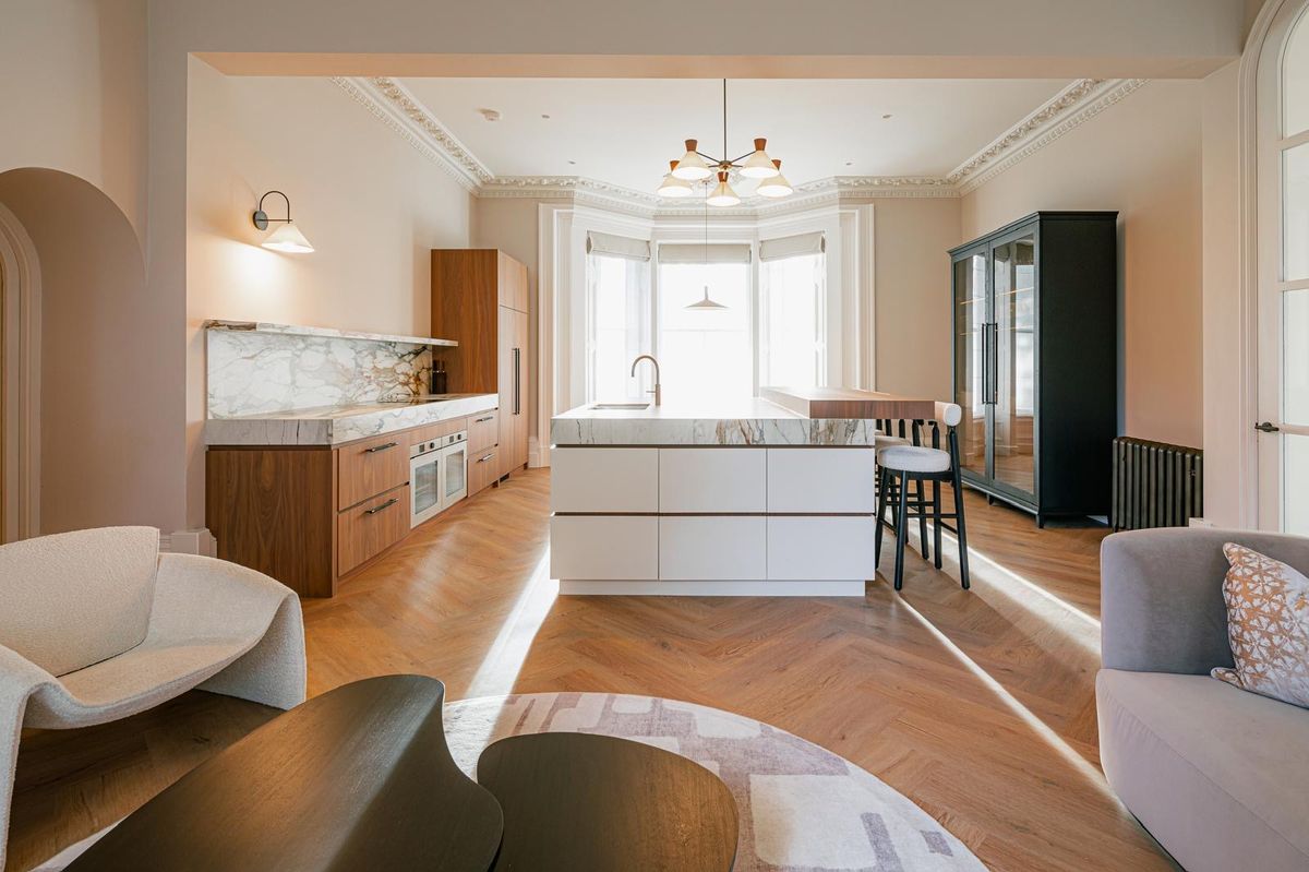 Restored kitchen and living space in a Victorian manor house, South Liverpool