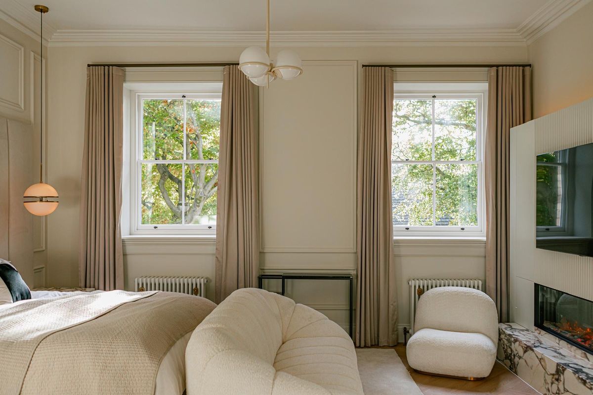 Restored bedroom with sash windows