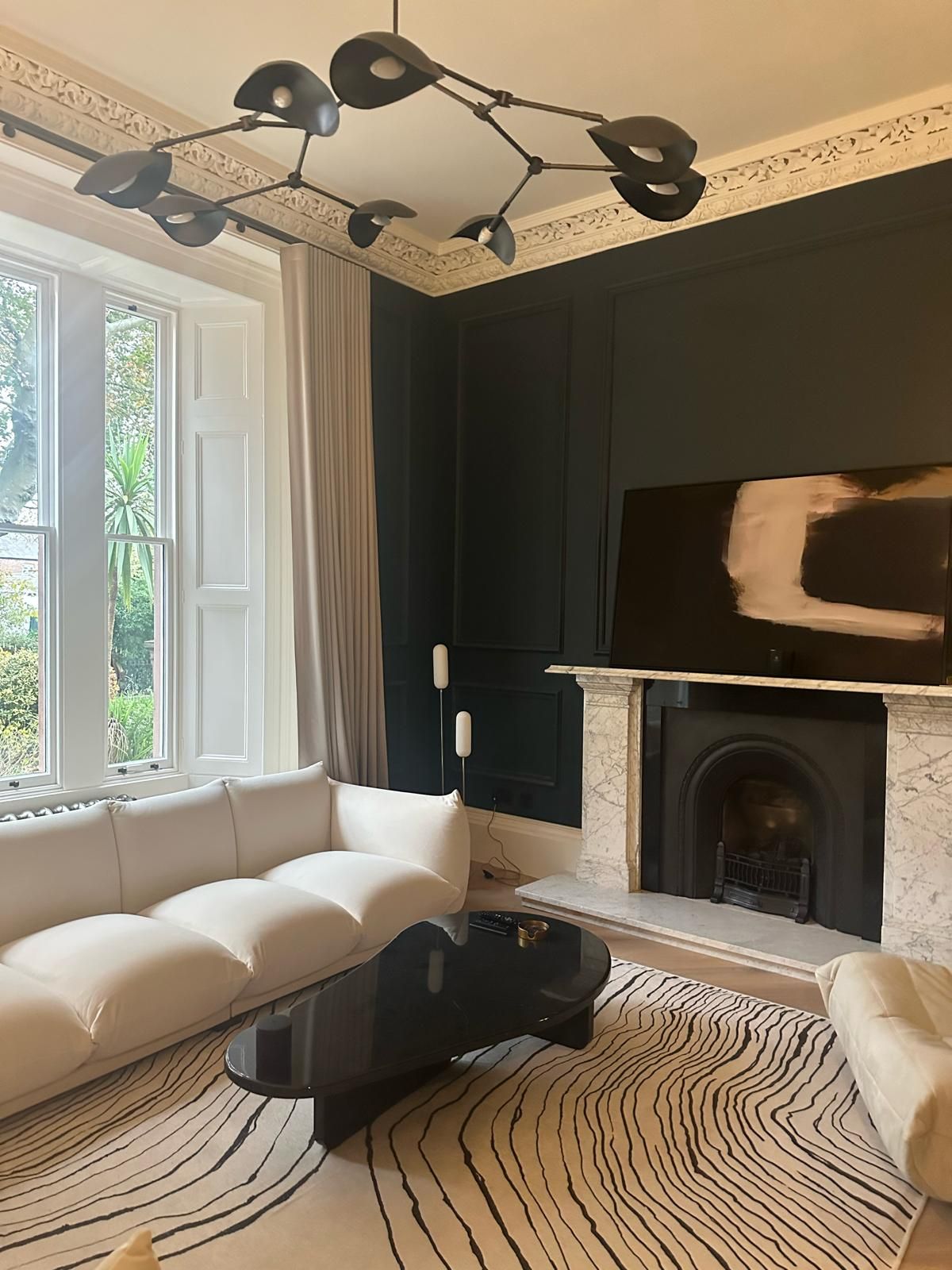Snug with original fireplace and bespoke joinery