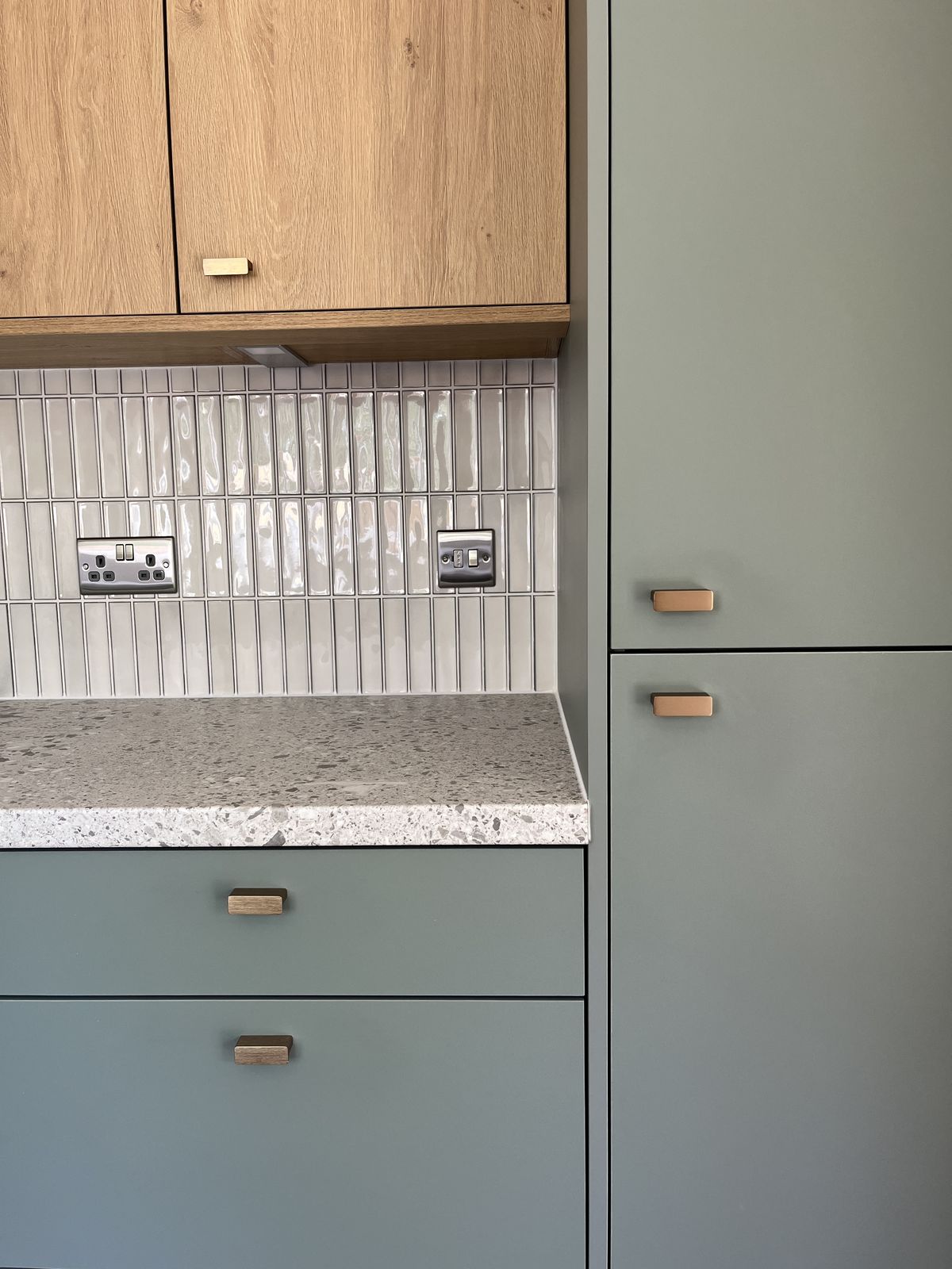 Kitchen detailing with brushed brass handles at Sorrel Way